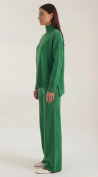 Conjunto de suéter de punto de cuello alto y pantalones vaqueros